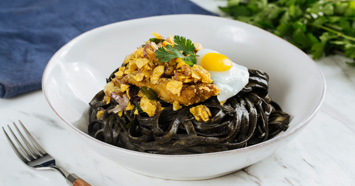 buttered cereal chicken with creamy squid ink laksa pasta